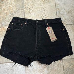 Brand new Levi’s 501 black shorts raw hem